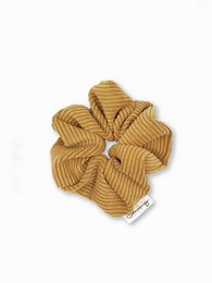 Yellow ribbed scrunchie made from recycled materials, featuring a flower-shaped design.