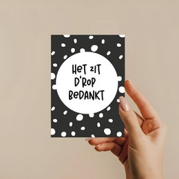  A greeting card with a black and white silhouette of tea cups and a teapot, along with the text "THEE MOMENTJE" and "Warm Bevelled".