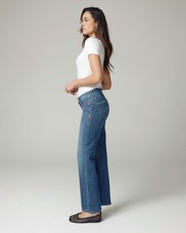 Helle, mittelhohe Jeans mit weitem Bein und Used-Waschung in Blau | Die Lolita
