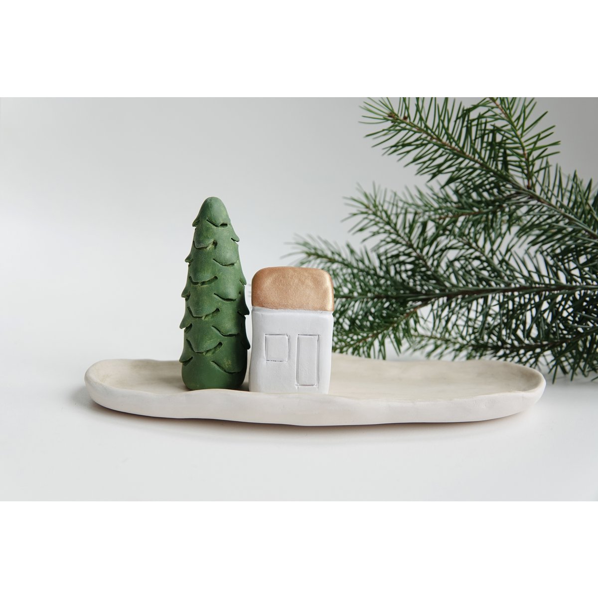 Christmas Giftbox with house, tree and candle