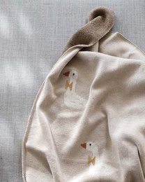 Gebreide katoenen babydeken, beige ganzen