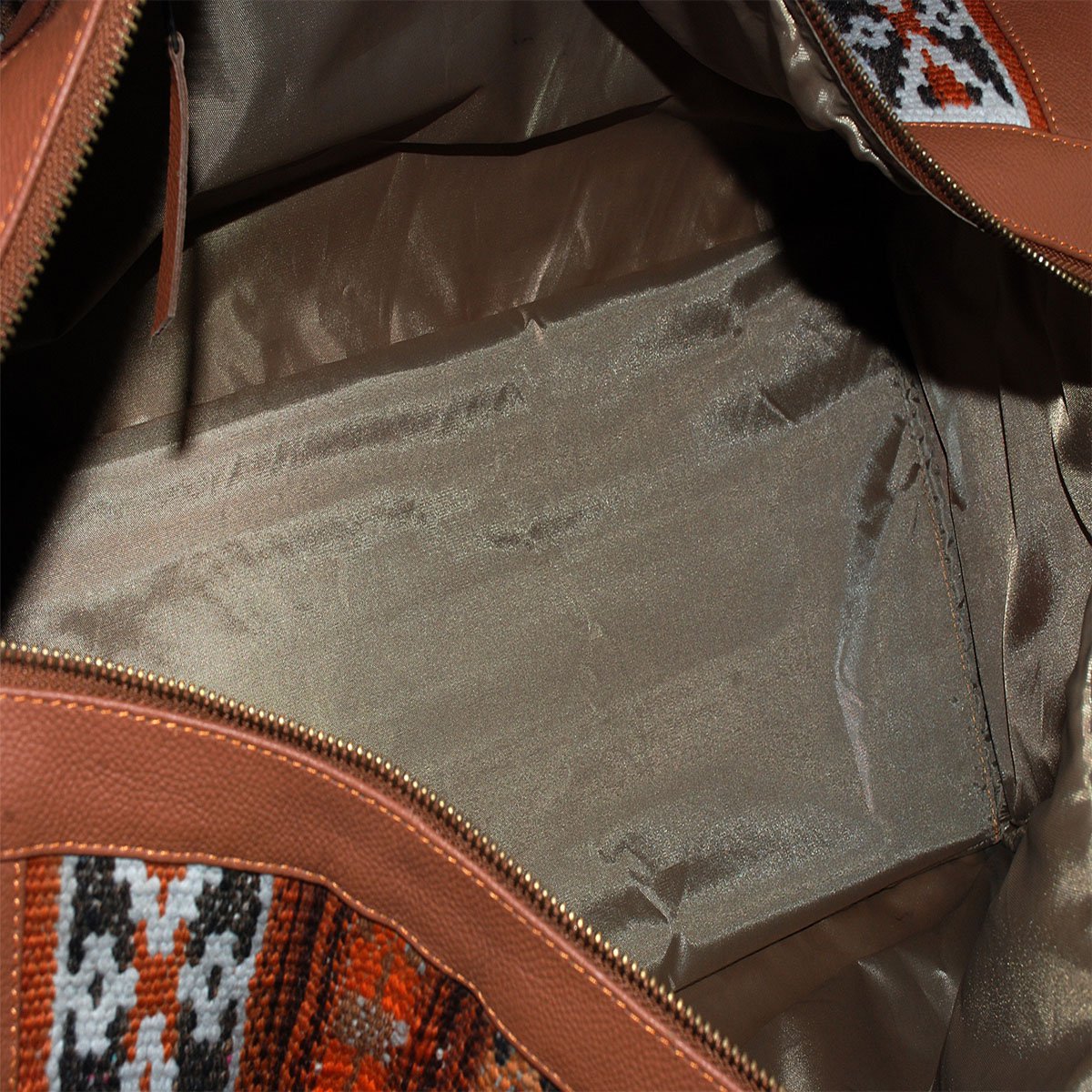 Skórzana, pastelowo-brązowa torba Kilim
