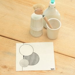 Sponge cloth with 3 circles and 1 line pattern, suitable for use as a tea towel.
