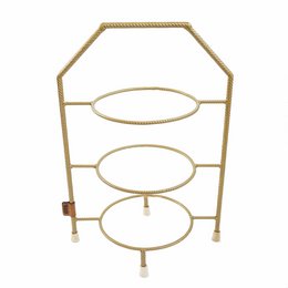 A gold-colored metal etagère with 3 round plates for displaying cakes or other desserts. The etagère has a rope-like handle and a simple, elegant design.