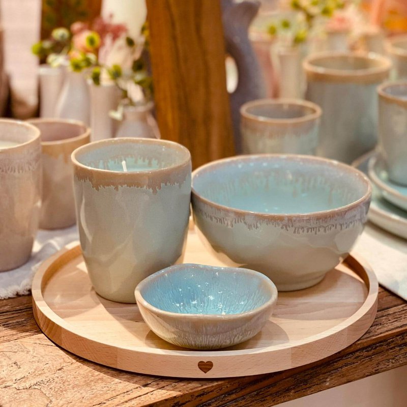 Stoneware candle in a turquoise espresso cup