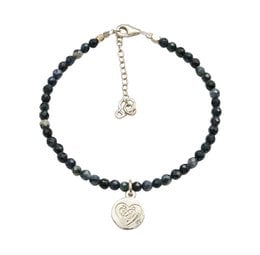 Silver-toned charm bracelet with black beads, featuring a heart-shaped charm with the text "Be Yourself" engraved on it. The bracelet has an adjustable chain for a customized fit.