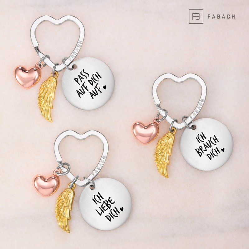 Llavero ángel de la guarda "Te amo" - amuleto de la suerte en forma de corazón con alas de ángel y placa grabada con un mensaje amoroso