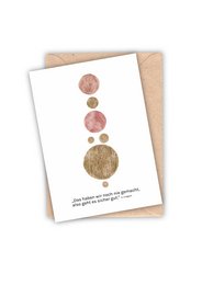A greeting card featuring a minimalist design with various circular shapes in different colors and textures, including metallic and matte finishes. The card appears to be part of a "Friendship Cards" collection.