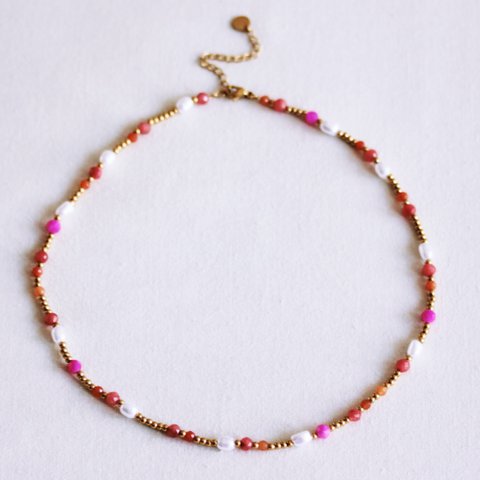 Kralenketting met parels en facetten - koraal/oranje/roze