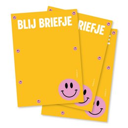 A6 sized yellow notepad with the text "Blu Briefje" printed on the cover, featuring a sun illustration. The notepad appears to be made of thick, high-quality paper suitable for writing or drawing.
