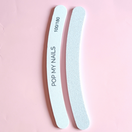 White nail file with 100/180 grit for nail care.