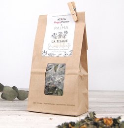 Herbal tea for oily skin, made with a blend of green leaves, orange pieces, and other natural ingredients.