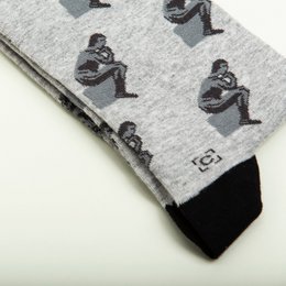Penseur Chaussettes