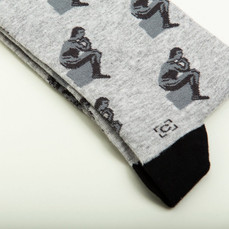 Penseur Chaussettes