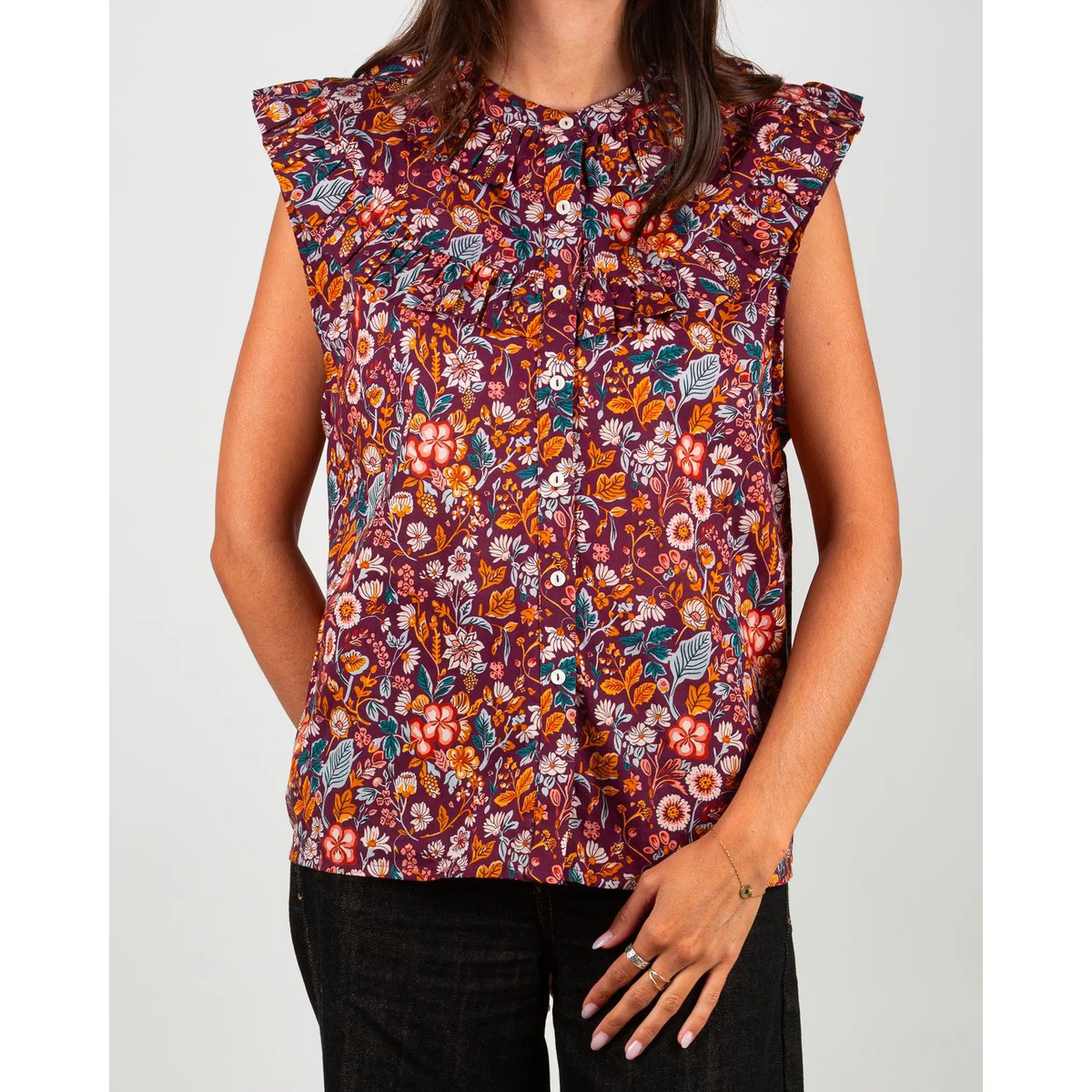 Blusa de mujer morris sin mangas con volantes