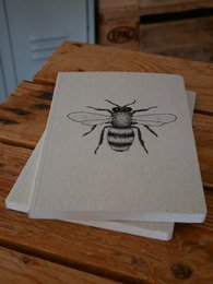 Grass paper notebook bee