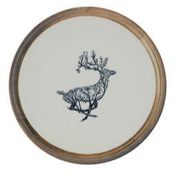 Decorative round serving plate with a deer silhouette design in a wooden frame.