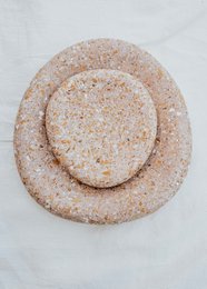 "Organic shaped cork tray, natural beige speckled material, round wavy edges, minimalist design"
