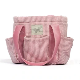  A pink corduroy tote bag with a zipper closure and multiple pockets, suitable for carrying items for a hobby horse.