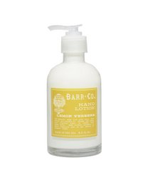 A duo of blood orange-scented hand soap and lotion in a sleek caddy. The soap and lotion feature a vibrant orange color and a refreshing blood orange fragrance.