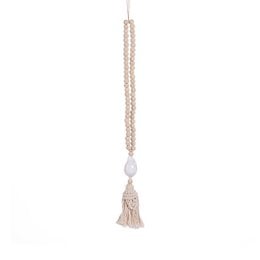 Natural white beaded necklace with tassel pendant