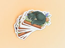 Cat on books sticker