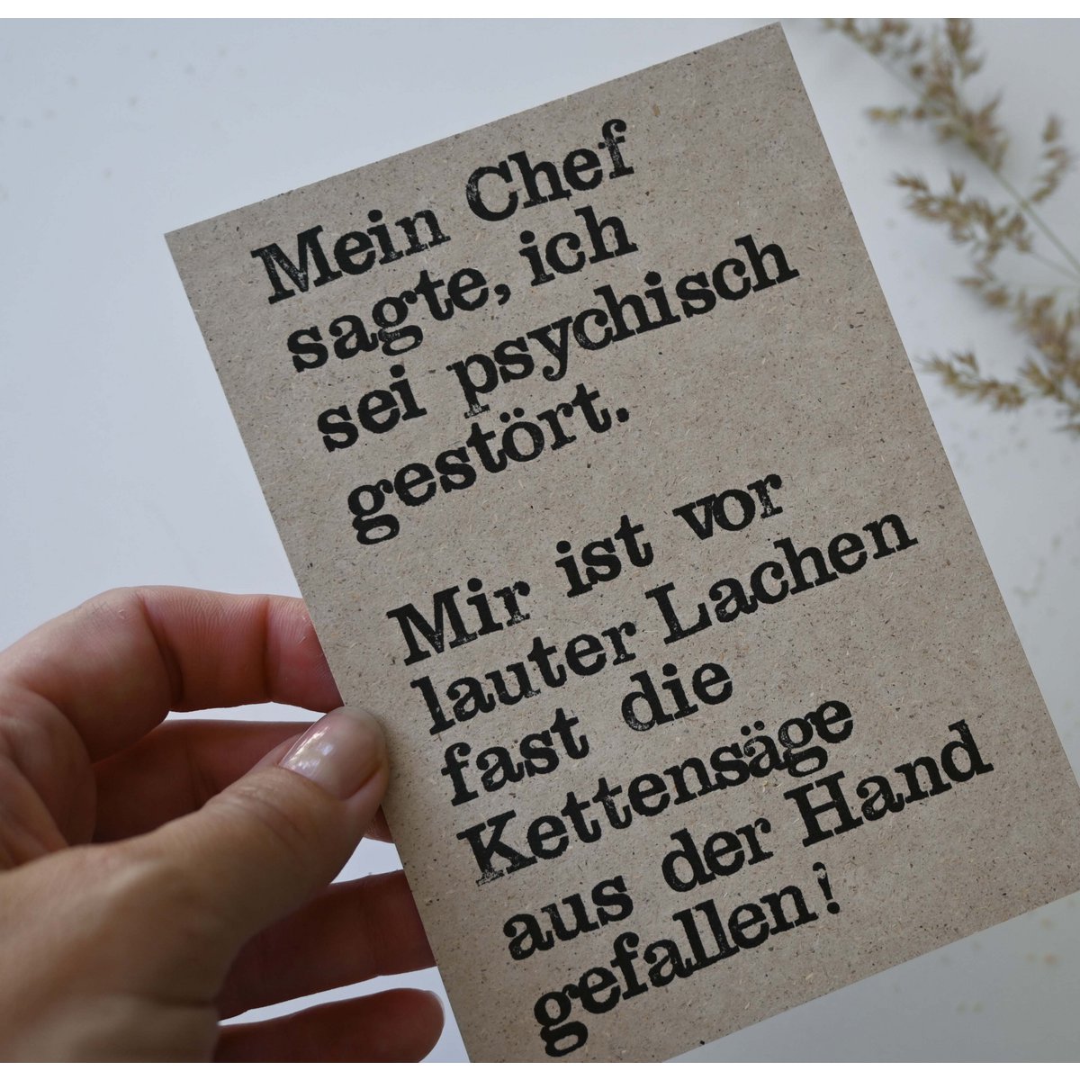 Stempelte Postkarte "Kettensaege"