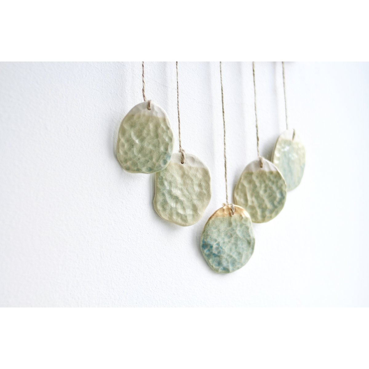 Bohemian wall hanger made of ceramic