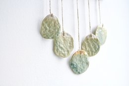Bohemian wall hanger made of ceramic