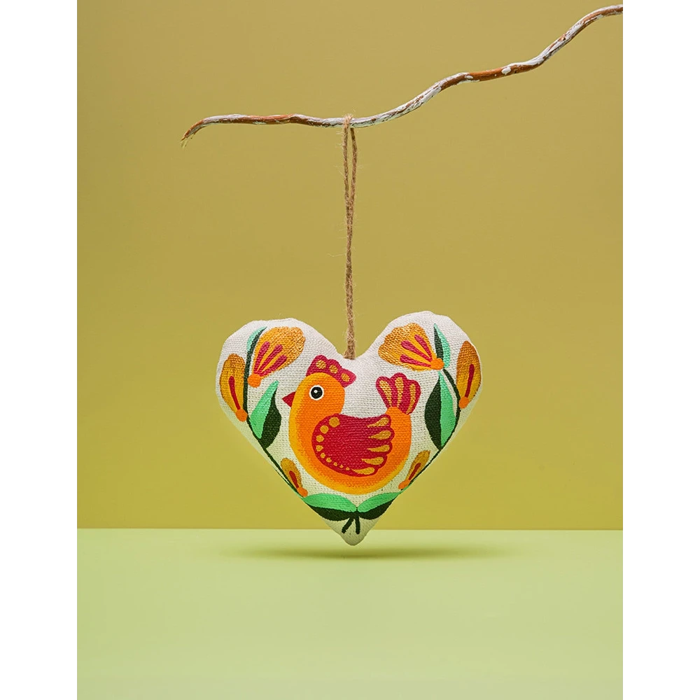Cuore di vaniglia con uccellino arancione