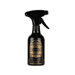  Black spray bottle, gold ornamental design, luxurious room fragrance, elegant packaging, oud scent.