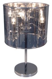 Deko-Table Light "Marella" de 56 cm de altura, Ø 33 cm, hecho de metal, película y acrílico en los colores cromados y transparentes.