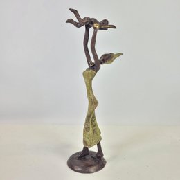 Scultura in bronzo "Baby in the air" di Soré | diverse dimensioni e colori