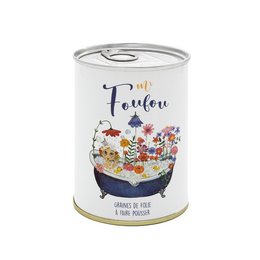 A round, tall tin candle with a colorful floral design and the text "Mr Foufou" printed on the label.