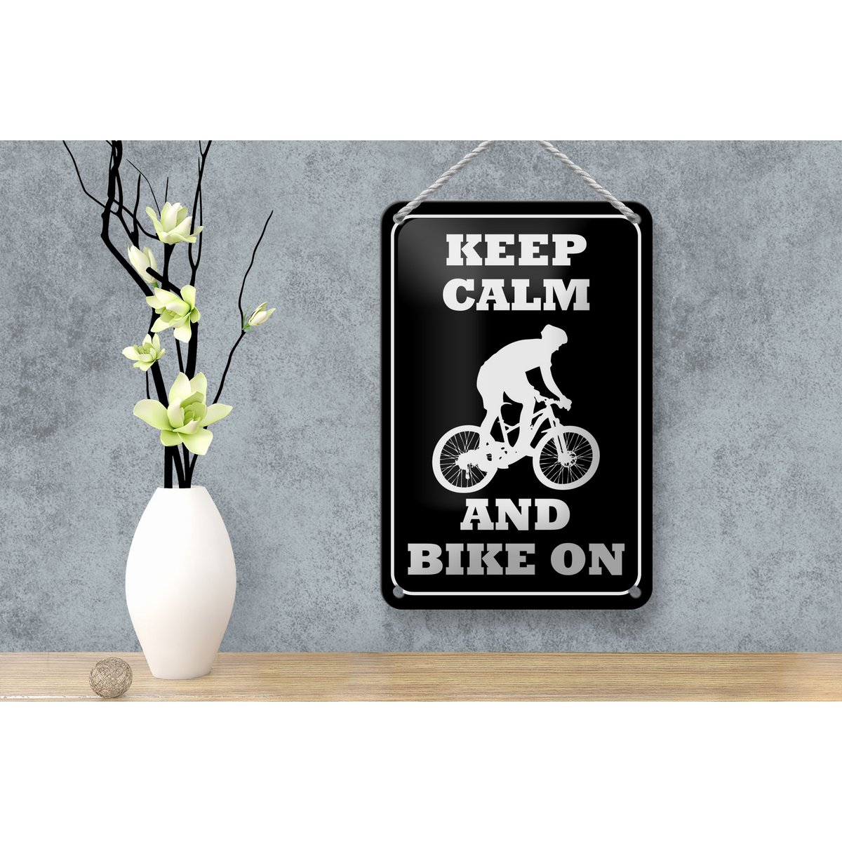 Tin sign saying 12x18cm Keep Calm and Bike on decoration