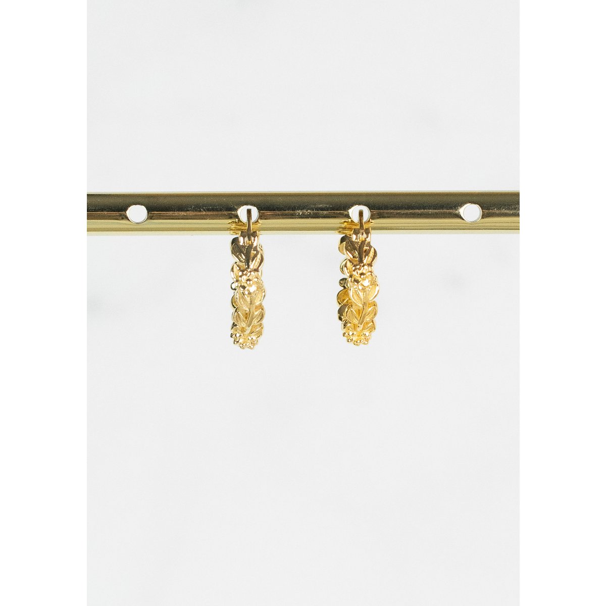 Arete flor chapado en oro 14k