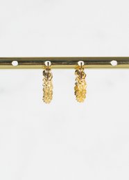 Arete flor chapado en oro 14k