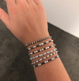 Dark blue beaded bracelets with silver accents
