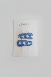 Fermagli per capelli blu con cuori bianchi
