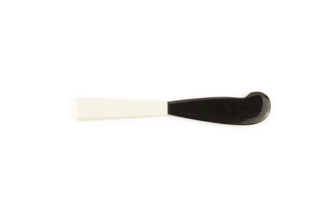 Butter knife with bone handle and black horn blade