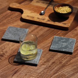 Slate coasters, square dark gray stone, natural chiseled edges, set of four, drink protection.