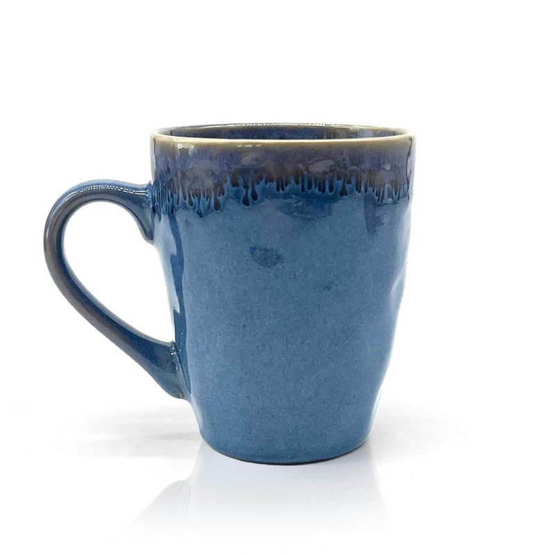 Stoneware mug with blue handle