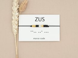 Stylish Morse code bracelet in silver, rose gold, and gold tones. Beaded design with Morse code accents. Versatile accessory for casual or formal wear.