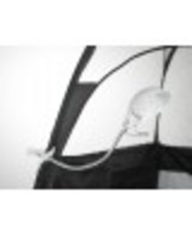 A modern, minimalist table lamp with a sleek, cylindrical design and a white shade that diffuses the light softly.