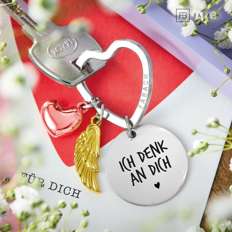 Llavero ángel de la guarda "Te amo" - amuleto de la suerte en forma de corazón con alas de ángel y placa grabada con un mensaje amoroso