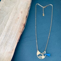 Elegant gold-tone necklace with a pendant featuring a geometric design and a blue accent. The necklace has a delicate chain and a lobster clasp closure, making it a stylish and versatile accessory.