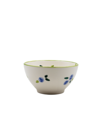  Dolce Berry Ceramic Cereal Bowl, a round, shallow bowl with a white base and scattered blue, green, and yellow dots or splatters across the surface, creating a playful, abstract pattern.