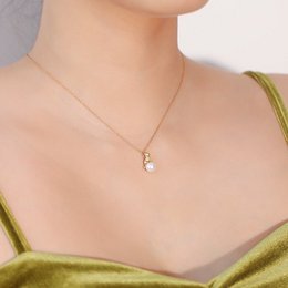 Orecchini e collana asimmetrici con gatti