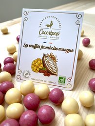 Raspberry mango soufflés, a delightful chocolate-covered fruit treat with a sweet and tangy flavor profile.