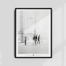 Black and white poster featuring people walking in an urban setting with a tall building in the background.